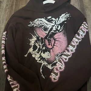 Revenge Clothing Brown Hoodie with Pink and White Graphic